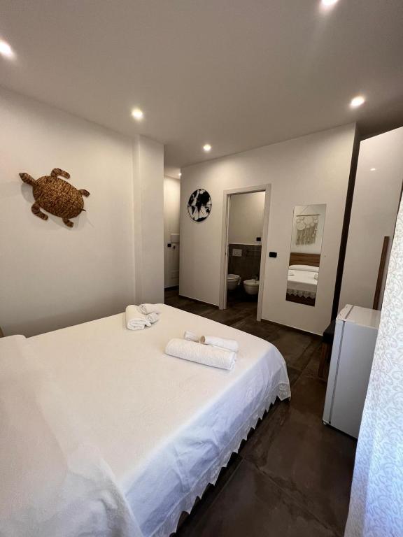Postel nebo postele na pokoji v ubytování B&B Hakuna Matata
