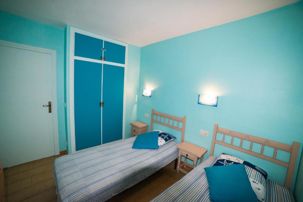 Postel nebo postele na pokoji v ubytování Appartement Vue Mer a Deux pas de la Plage
