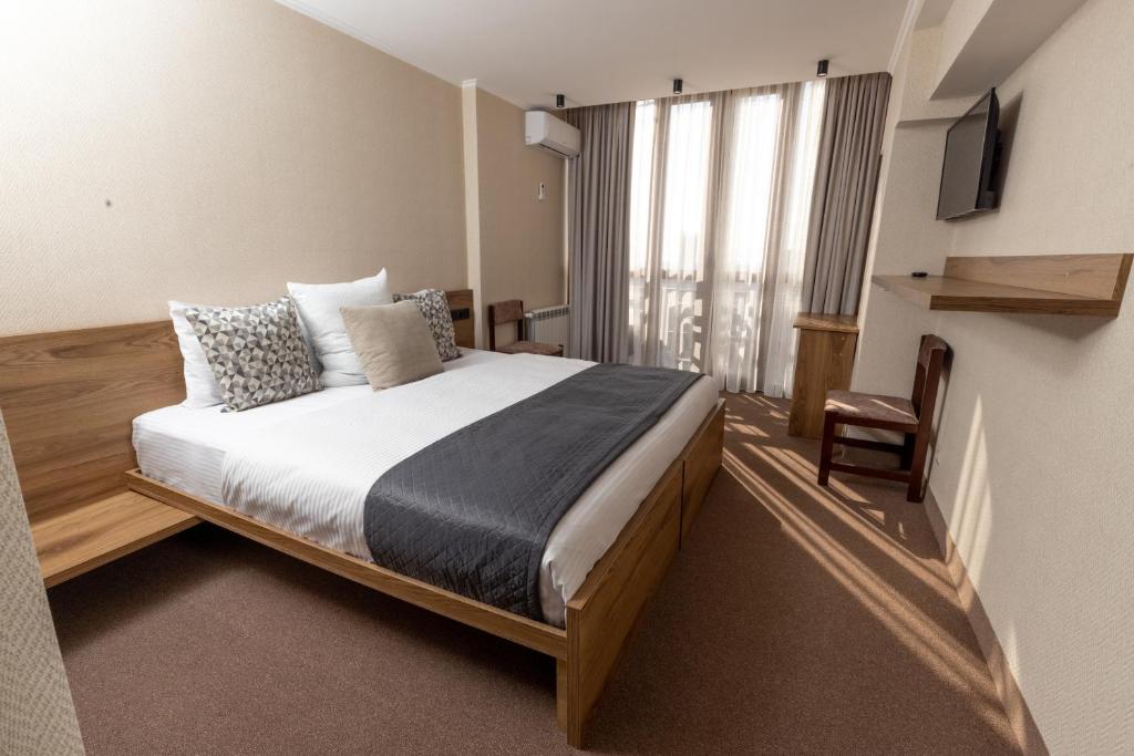 Postel nebo postele na pokoji v ubytování Shirak Hotel