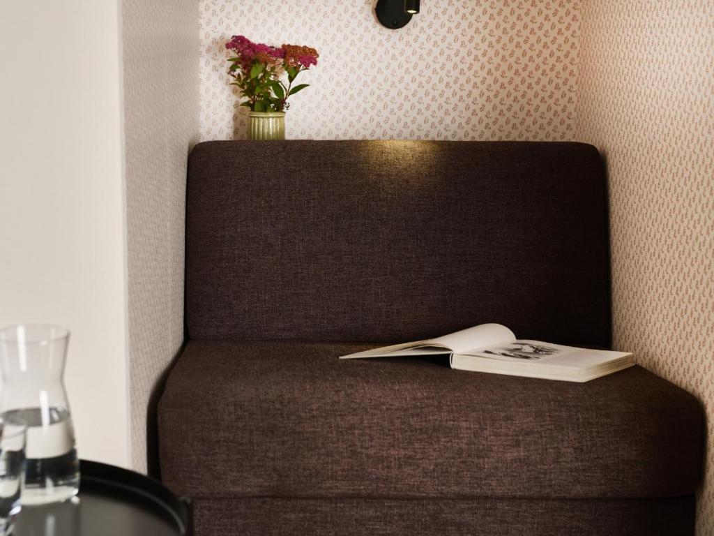 Postel nebo postele na pokoji v ubytování Hotel Garni Buchenhof