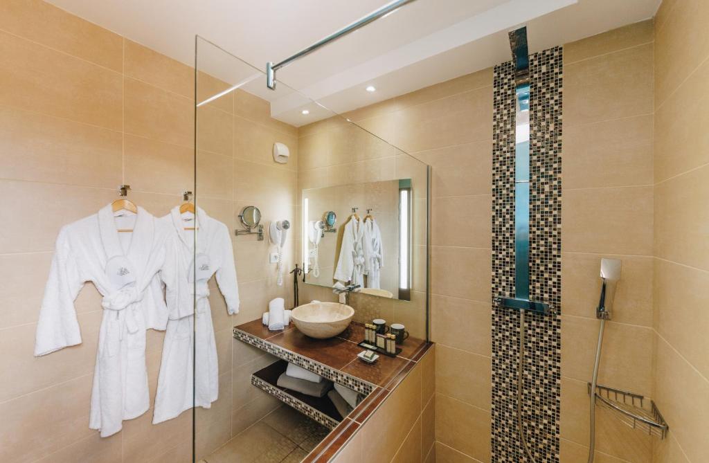 Koupelna v ubytování Hôtel Liberata & Spa