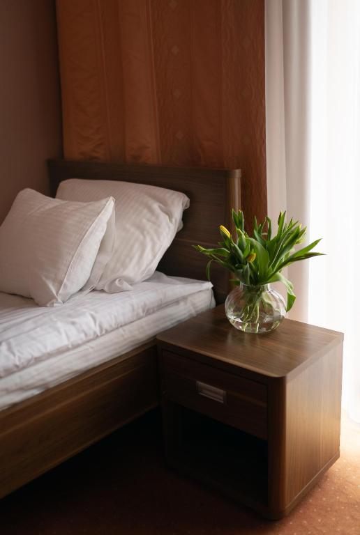 Posteľ alebo postele v izbe v ubytovaní Paria Hotel