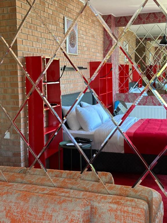 Postel nebo postele na pokoji v ubytování 10inn Boutique Hotel