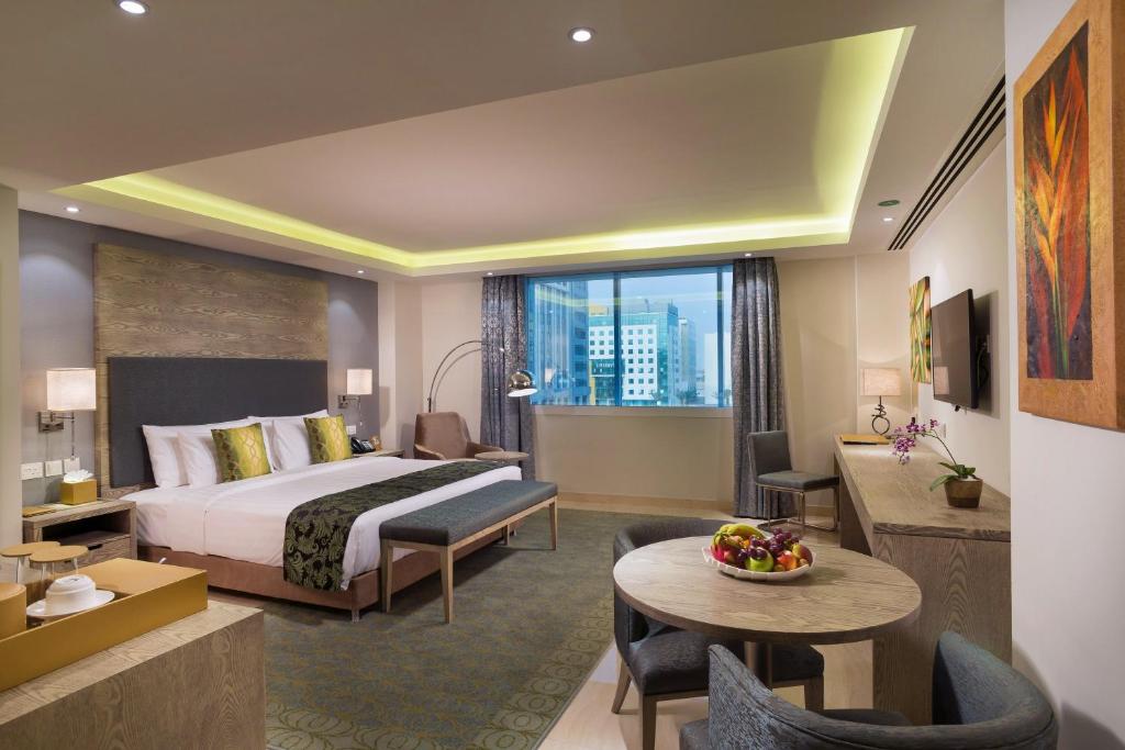 Centara Muscat Hotel Omanにあるベッド