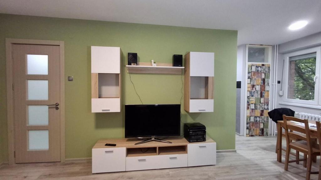 TV a/nebo společenská místnost v ubytování Osmica