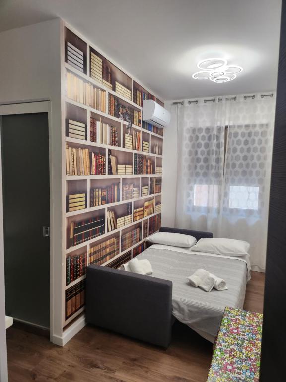 Posteľ alebo postele v izbe v ubytovaní B&B Magia