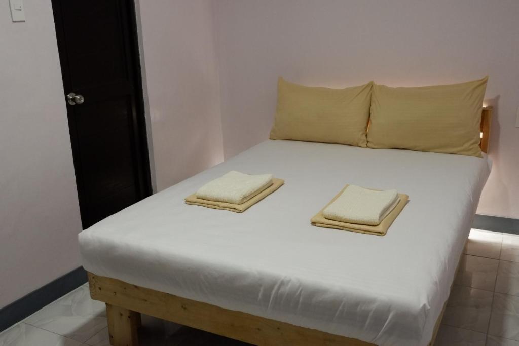 Postel nebo postele na pokoji v ubytování Borj Hotel