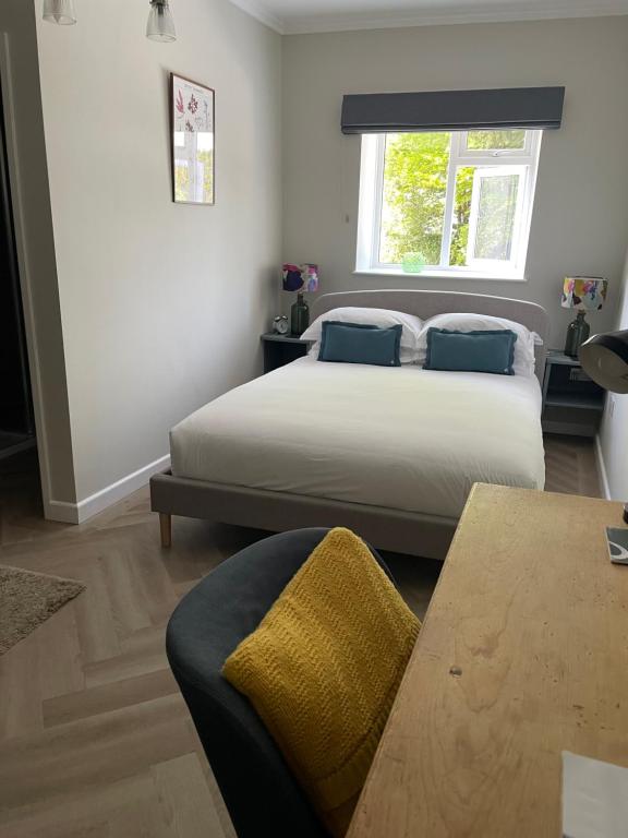 Postel nebo postele na pokoji v ubytování Chillington House