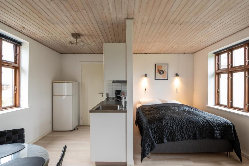 Postel nebo postele na pokoji v ubytování Little studio house