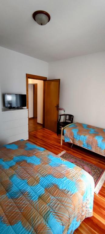 Postel nebo postele na pokoji v ubytování Casa Affitto Daone