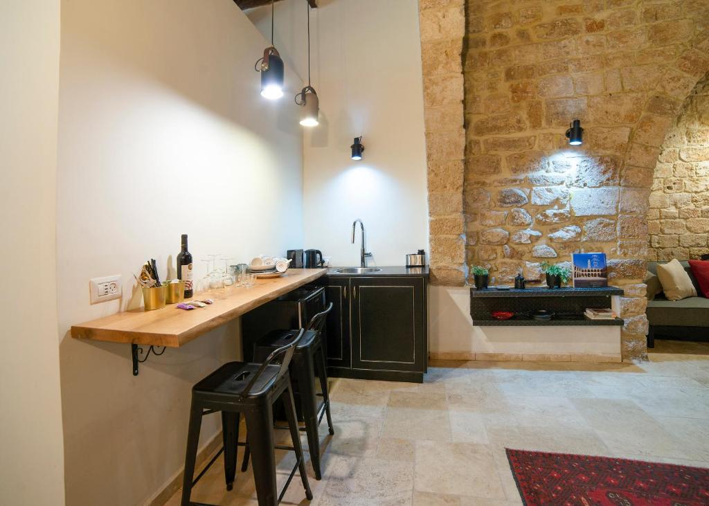 Kuchyň nebo kuchyňský kout v ubytování Napoleon suites