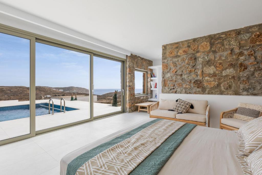 Ένα ή περισσότερα κρεβάτια σε δωμάτιο στο Citadel Natural Stone Villa