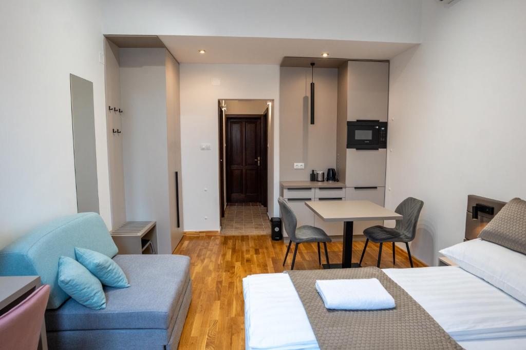 TV a/nebo společenská místnost v ubytování Végvár Spa Apartman