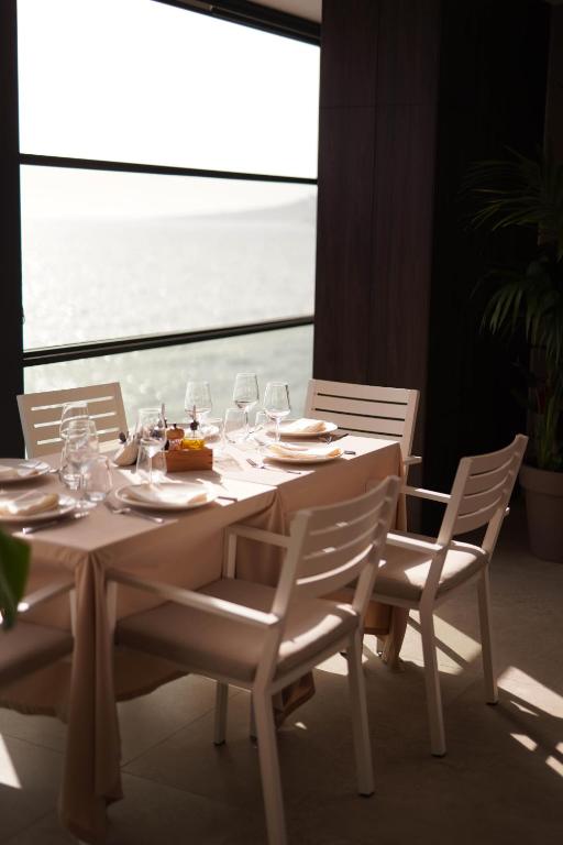 Posezení v ubytování Joelle Premium Hotel