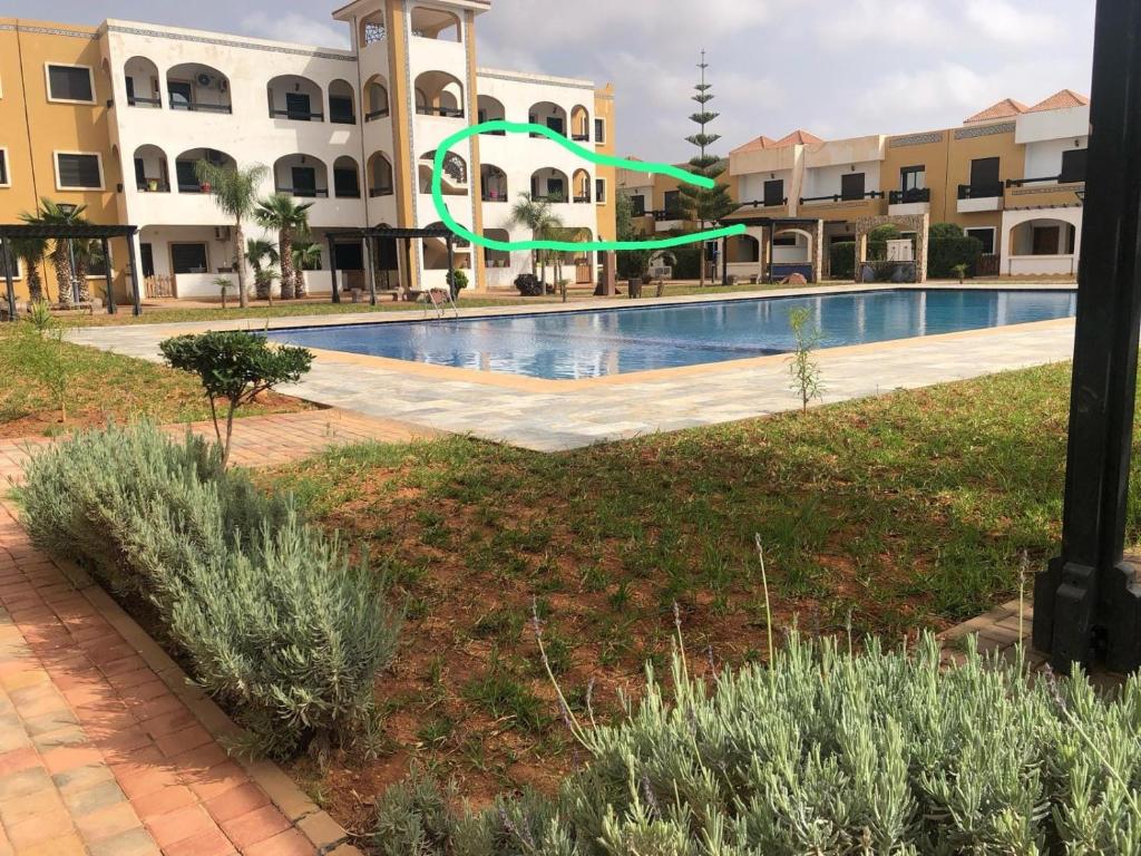 Bazén v ubytování Salicorne Saidia avec piscine nebo v jeho okolí