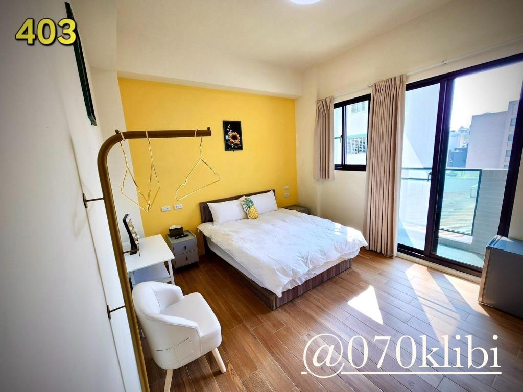 Postel nebo postele na pokoji v ubytování Huatian B&B