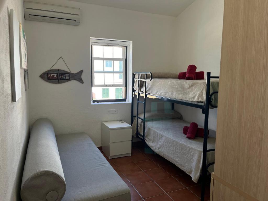 Postel nebo postele na pokoji v ubytování ATALAIA 11 by SOM Menorca