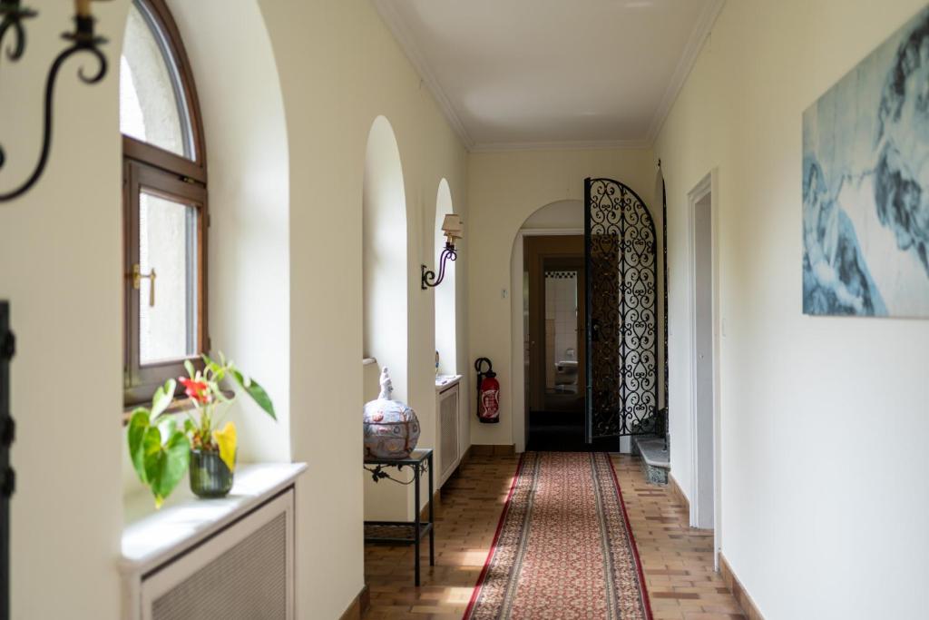 Fotografie z fotogalerie ubytování Suite Stays by Hotel La Perla v destinaci Ascona