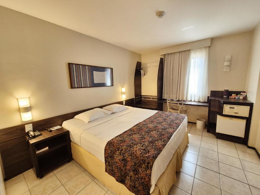 Postel nebo postele na pokoji v ubytování Hotel Sonata de Iracema