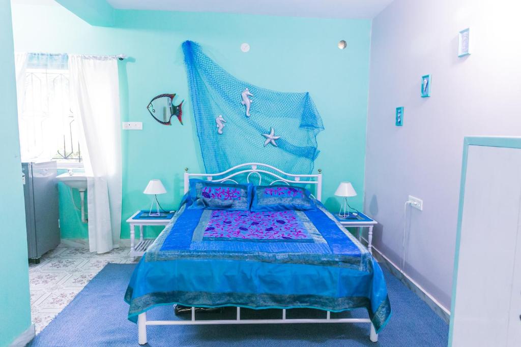 Postel nebo postele na pokoji v ubytování Orange Villa