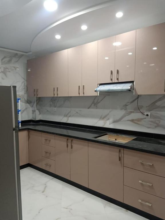 Kuchyň nebo kuchyňský kout v ubytování appartement équipé 3e étage