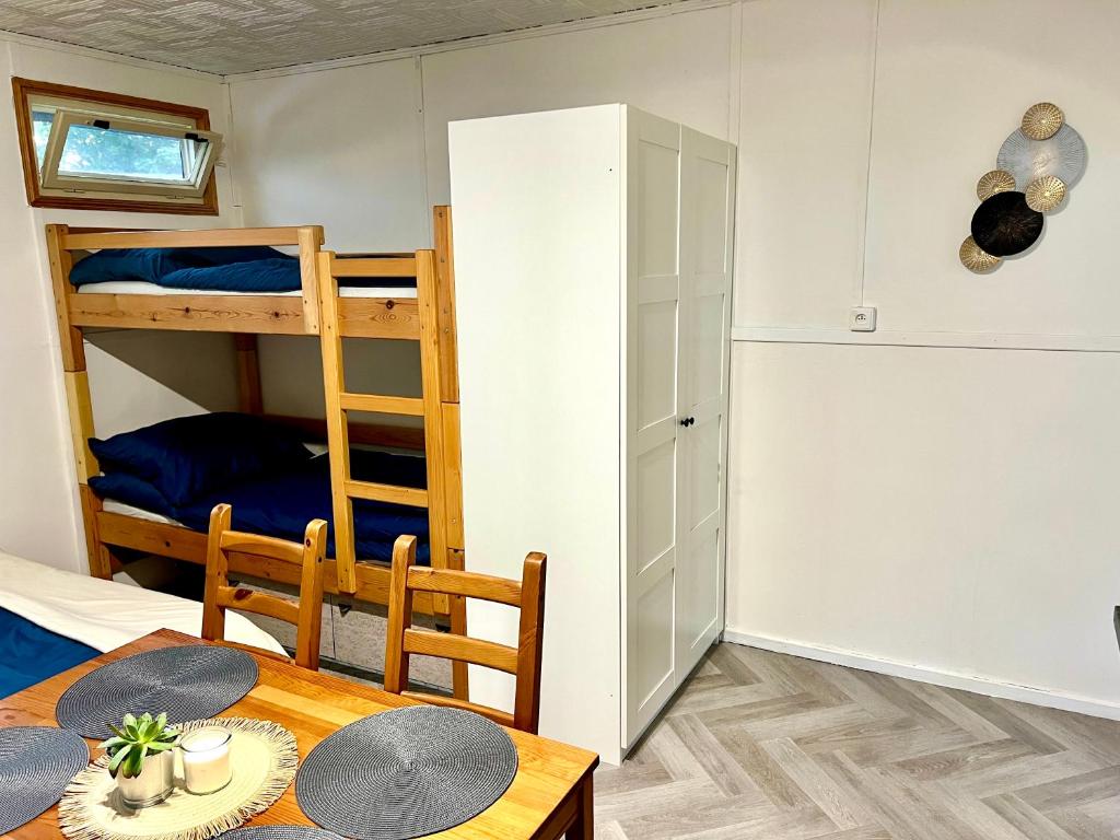 Postel nebo postele na pokoji v ubytování Chatky na Rozkoši - Tina