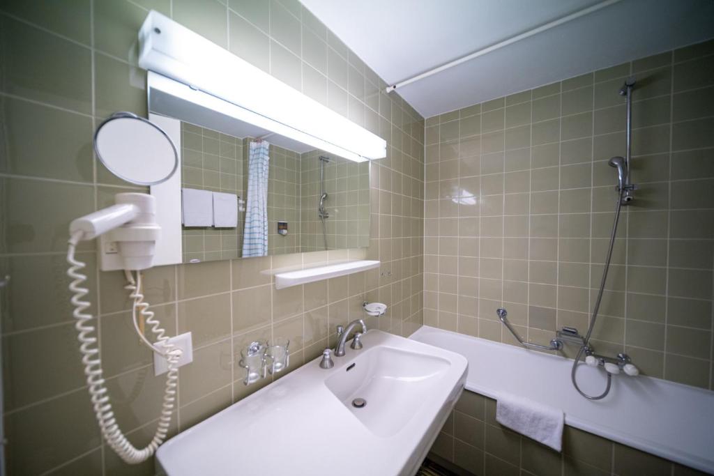 Koupelna v ubytování Hotel La Perla