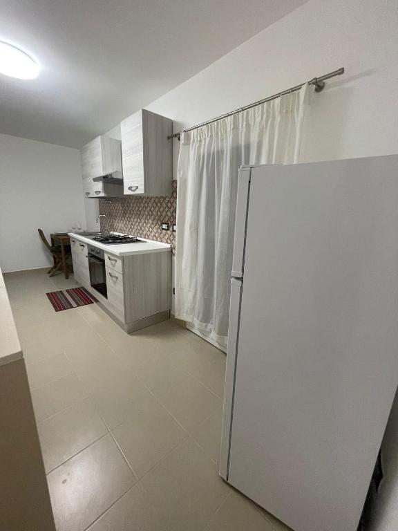 Kuchyň nebo kuchyňský kout v ubytování Kyansa Sicily a Pachino