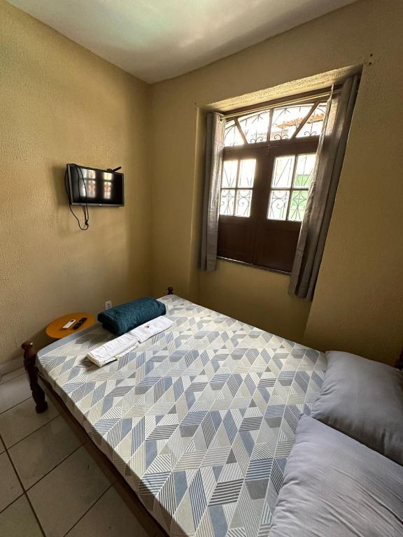 Postel nebo postele na pokoji v ubytování RioSlz Hostel