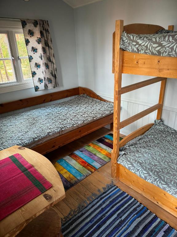 Postel nebo postele na pokoji v ubytování Ninase Puhkemajad