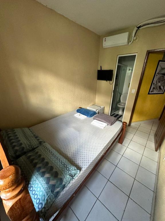 Postel nebo postele na pokoji v ubytování RioSlz Hostel