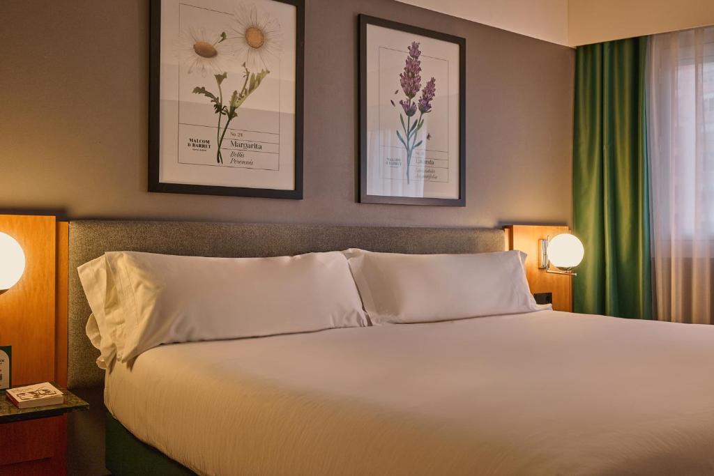 Cama o camas de una habitación en Hotel Malcom and Barret