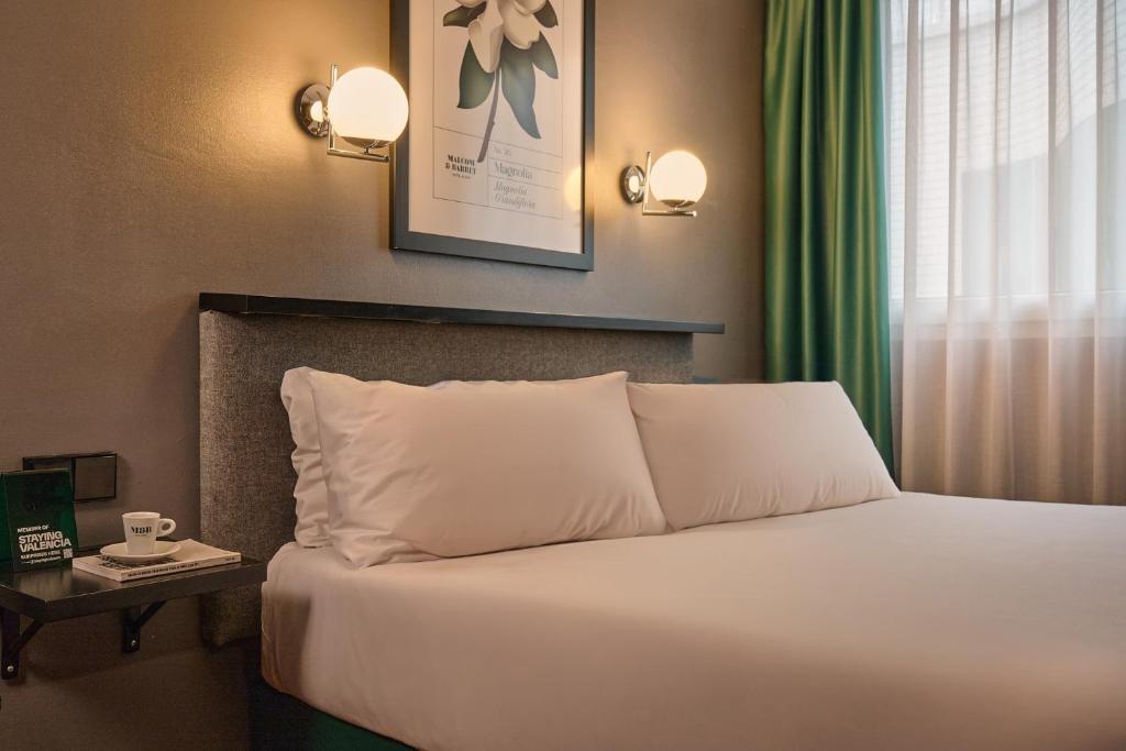 Cama o camas de una habitación en Hotel Malcom and Barret