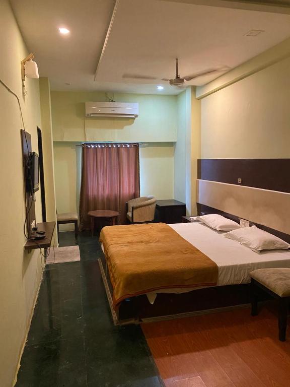 Postel nebo postele na pokoji v ubytování Hotel Skylark