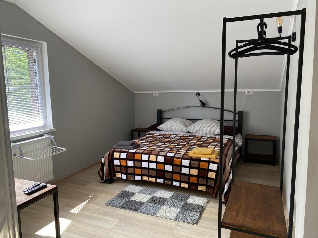 Postel nebo postele na pokoji v ubytování Mini-Hotel Serpanok