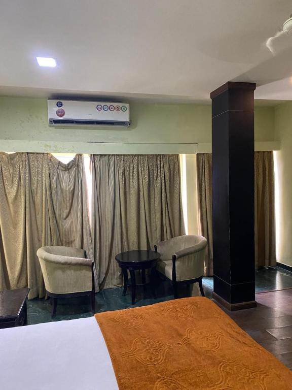 Postel nebo postele na pokoji v ubytování Hotel Skylark