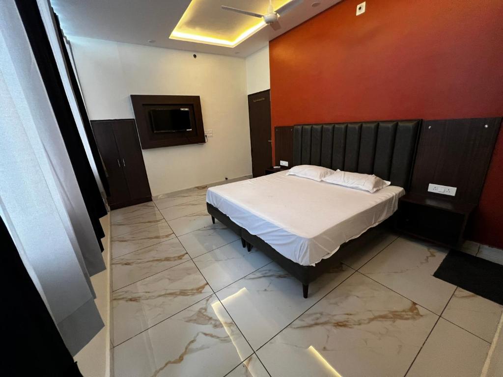 Postel nebo postele na pokoji v ubytování Hotel AJL