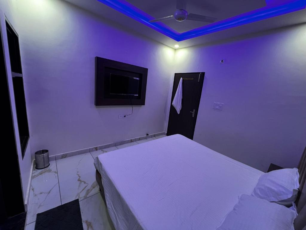 TV a/nebo společenská místnost v ubytování Hotel AJL