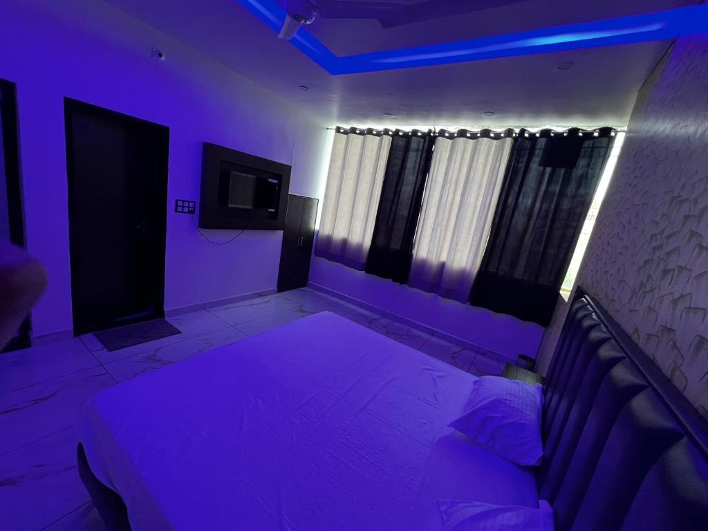 Postel nebo postele na pokoji v ubytování Hotel AJL