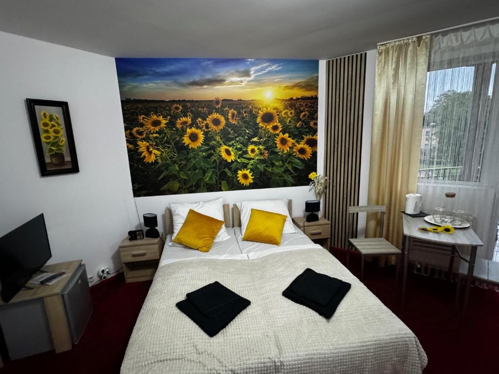 Postel nebo postele na pokoji v ubytování BUTIK Hotel 350m od plaży
