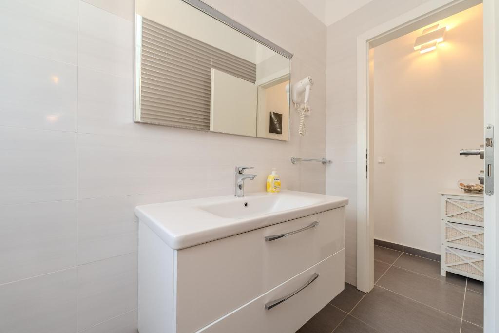Koupelna v ubytování Apartments Dalmatia