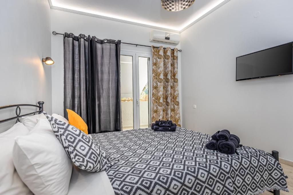 Postel nebo postele na pokoji v ubytování Riviera Apartment