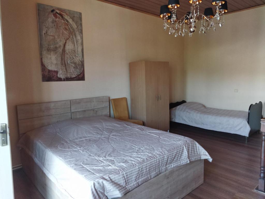 Postel nebo postele na pokoji v ubytování KETOS HOME