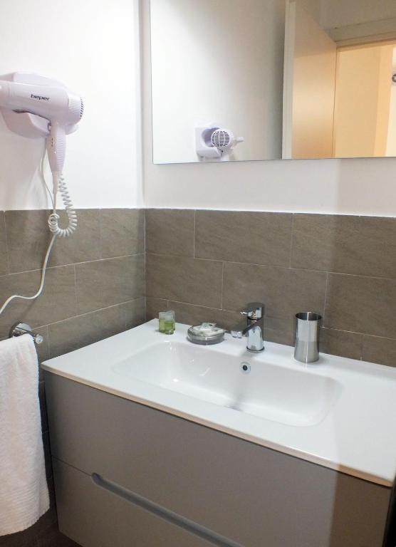 Koupelna v ubytování BB Hotels Aparthotel Visconti
