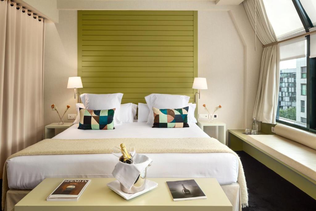 Postel nebo postele na pokoji v ubytování Hotel Miró