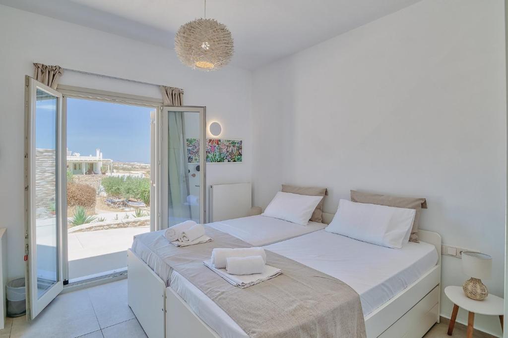 Postel nebo postele na pokoji v ubytování Margo Seaview Antiparos