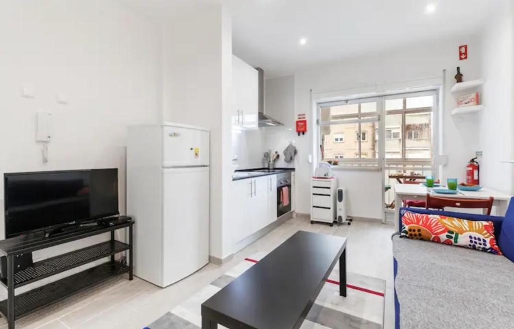 Kuchyň nebo kuchyňský kout v ubytování Beautiful 1 Bedroom Apartment near Benfica