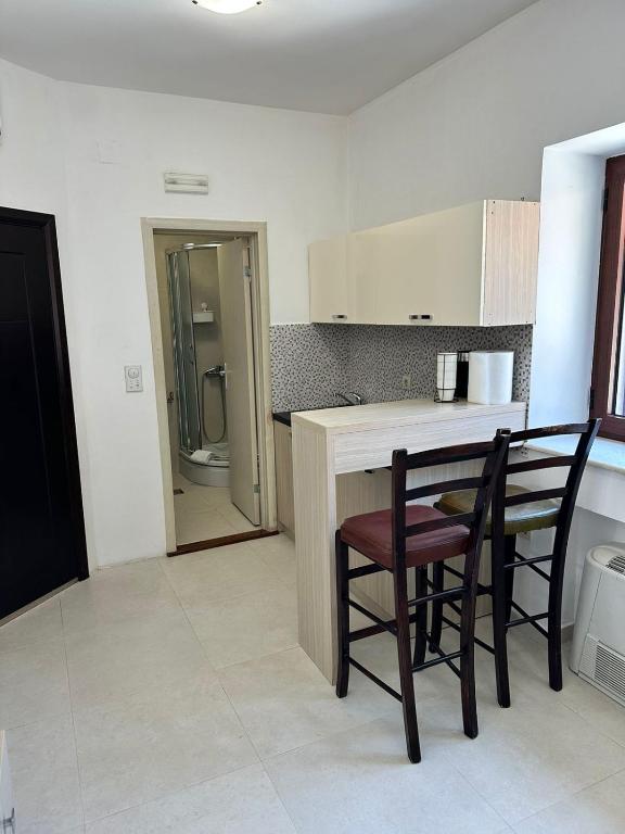 Kuchyň nebo kuchyňský kout v ubytování Filip Deluxe Rooms