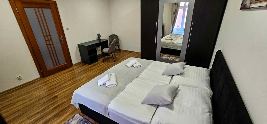 Posteľ alebo postele v izbe v ubytovaní Garni Hotel Tatramonti
