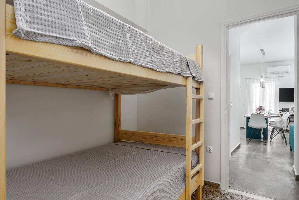 Postel nebo postele na pokoji v ubytování Aphrodites Place
